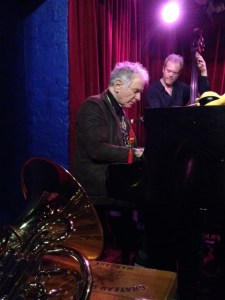 David Amram at Cornelia Street Cafe, January 4, 2015; bassist Rene Hart behind him. Photo © 2015 Ira Mayer.